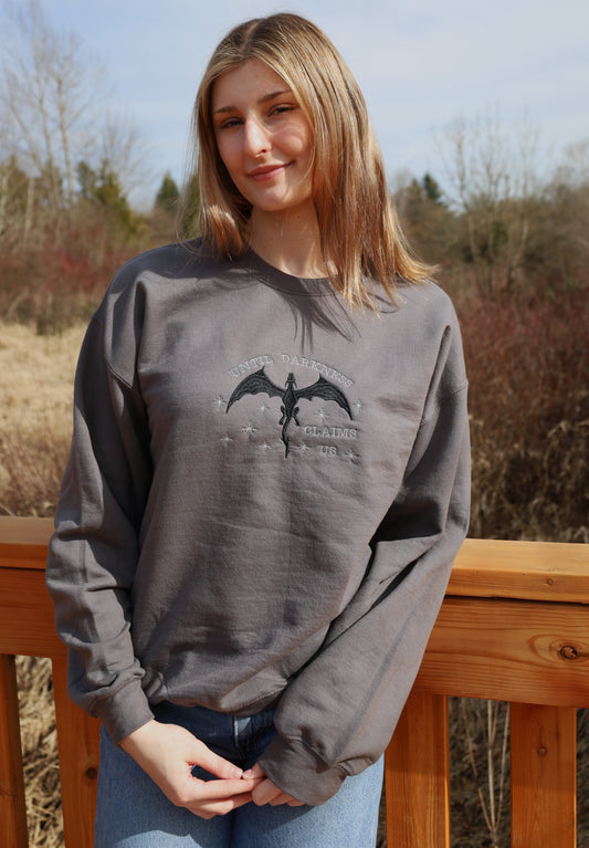 Until Darkness Claims Us Embroidered Crewneck Sweatshirt